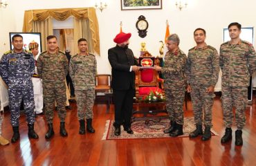 A delegation of officers participating in the Higher Command Course called on Governor Lieutenant General Gurmit Singh (Retd.) .