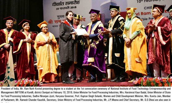 presenting degree to a student at the 1st convocation