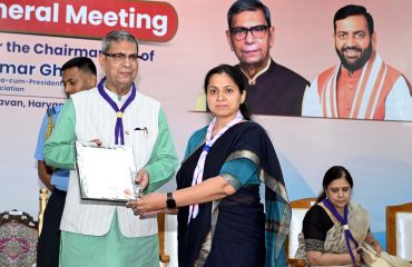 Haryana Governor Prof. Ashim Kumar Ghosh presenting award to Commissioner and Secretary Smt Ashima Brar during the 44th Annual General Meeting of Haryana State Bharat Scouts and Guides at Lok Bhavan in Chandigarh on July 20, 2026