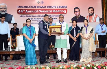 Haryana Governor Prof. Ashim Kumar Ghosh being presented with a memento by Dr. K.K. Khandelwal, State Chief Commissioner, Haryana State Bharat Scouts and Guides during the 44th Annual General Meeting of Haryana State Bharat Scouts and Guides at Lok Bhavan in Chandigarh on July 20, 2026.