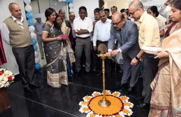 Chief Secretary lighting the ceremonial lamp