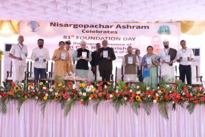 22.03.2026: The Vice President of India C P Radhakrishnan presided over the 81st Foundation Day of the Nisargopchar Ashram at Urulikanchan, Pune. Maharashtra Governor Jishnu Dev Varma, Deputy Chairman of Rajya Sabha Harivansh Narayan Singh, Deputy Chief Minister Sunetra Pawar, and Trustee of the Ashram Dr Narayan Hegde were among those present. The Vice President visited various service facilities at the Ashram, interacted with the attendees, and extended his best wishes for its future endeavours. The Vice President released the book titled “Secrets of Happiness” authored by Dr. Narayan Hegde.