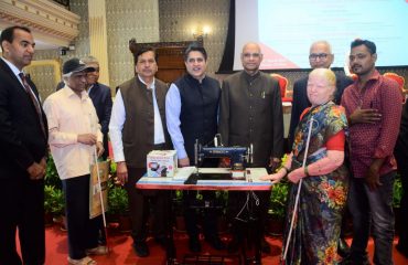 26.03.2023 : Governor presents Stitching Machine and Flour Mills to 75 Divyangs