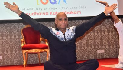 Governor leads Raj Bhavan in performing yoga