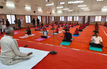 Governor performs yoga exercises along with the students of the Government Tribal Ashram School