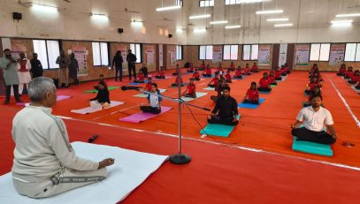 Governor performs yoga exercises along with the students of the Government Tribal Ashram School