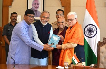 Economist Dr. Narendra Jadhav accompanied by members of the Dr. Babasaheb Ambedkar Birth Anniversary meets Governor