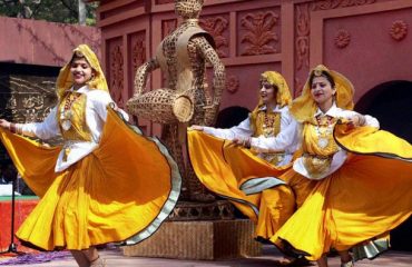 Girls performing Folk Dance in Festival.