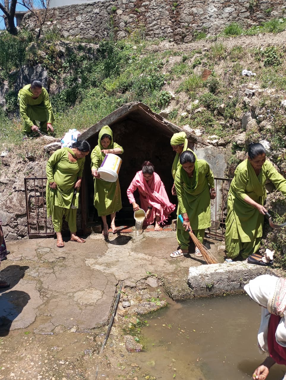 Cleanliness drive of natural drinking water sources by Women