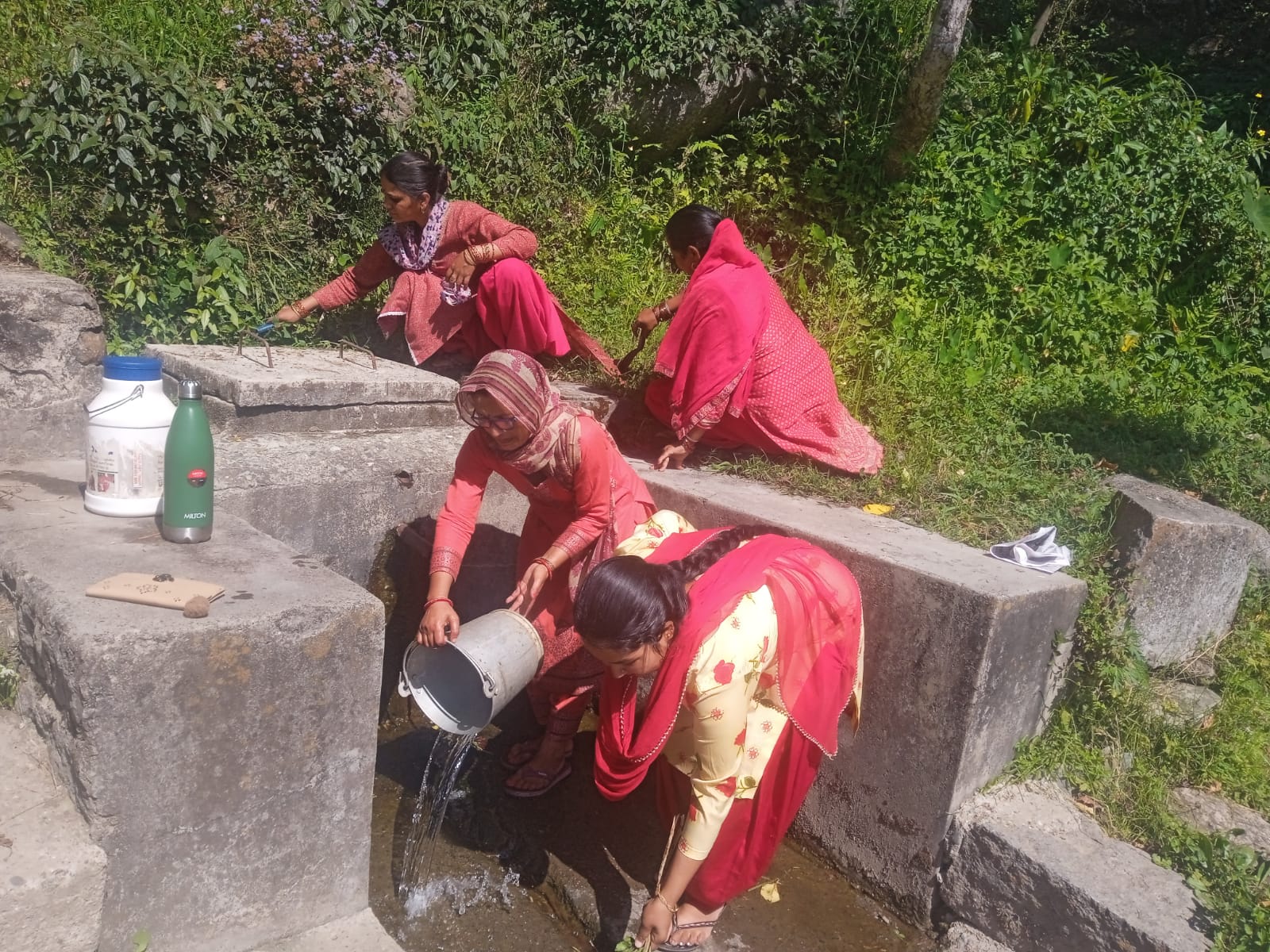 Cleanliness drive of natural drinking water sources by Women