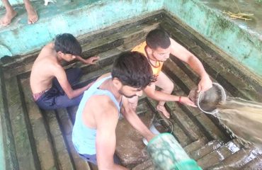 Cleanliness drive of natural drinking water sources by men