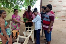 Students marketing the harvested vegetables as part of gardening curriculum