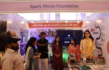 This picture is of the Spark Minda Foundation's stall at Purple Fest 2025.