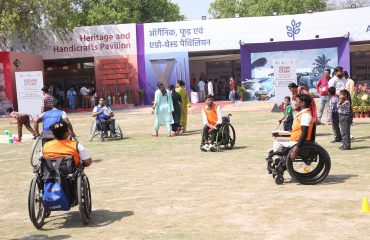 In the Game Zone of Purple Fest 2025 at Rashtrapati Bhavan, divyang boys are enjoying games.