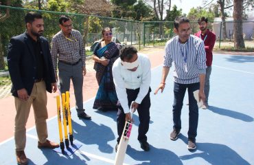 The Secretary of the Department of Empowerment of Persons with Disabilities is playing cricket to encourage visually impaired children in the Game Zone of Purple Fest 2025 at Rashtrapati Bhavan.