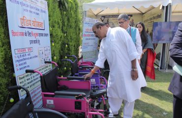 At the Chintan Shivir program, the Hon’ble Union Minister Dr. Virendra Kumar is testing a tricycle made by ALIMCO.