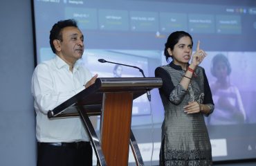 In the Purple Talk 2.2 program, Mr. Rajesh Agrawal, Secretary of the Department of Empowerment of Persons with Disabilities, is addressing the audience.