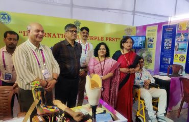 This picture is from the International Purple Fest 2025 held in Goa. In the photo, Joint Secretary and Economic Adviser of DEPwD, Mrs. Debolina Thakur, and Deputy Director General, Mrs. Richa Shankar, are posing for a group photo with the officials of the National Institute for Locomotor Disabilities at the institute’s stalls.