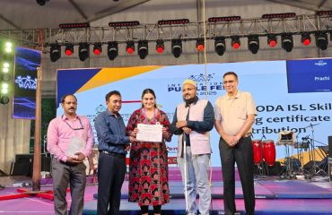 This image shows the recognition ceremony organized by the Indian Sign Language Research and Training Centre (ISLRTC) during the International Purple Fest, Goa, on 10 October 2025. In the picture, Shri Rajesh Aggarwal, Secretary, DEPwD, is seen presenting a certificate to a CODA/SODA professional. Also present in the image are Shri Jasbir Singh, Deputy Secretary, DEPwD, and Shri Kumar Raju, Director, ISLRTC.