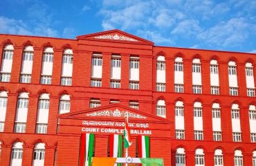 Flag hosting by Smt Shanthi K. G.,Prl District & Sessions Judge,Ballari