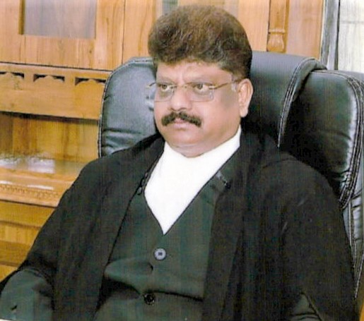 Justice Abhay S. Waghwase