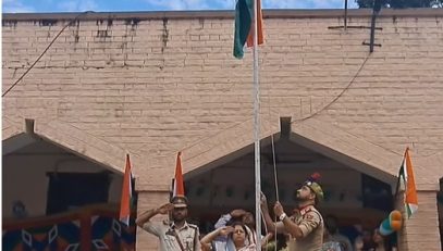 Principal District and Sessions Judge Reasi hoisting national flag on Independence day