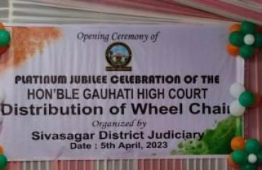 banner of wheel chair distribution ceremony