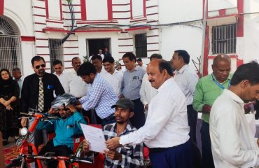 Tri cycle distributed by Nodal Officer on National lok adalat