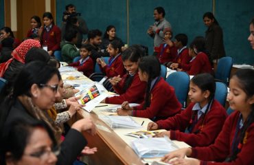 Students and Parents learn sign through new basic sign language book.