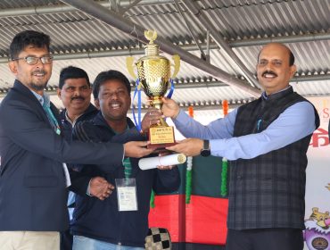 Hon'ble DC Shri D P Patel sir presenting winner Trophy (Table Tennis)