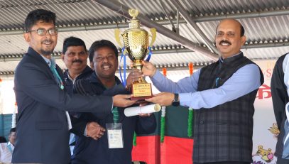 Hon'ble DC Shri D P Patel sir presenting winner Trophy (Table Tennis)