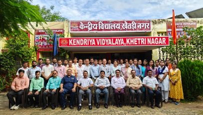 staff photo with inspecting team