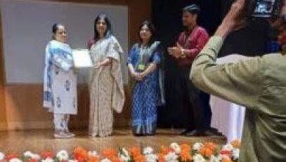 Shalini Mam receiving Award
