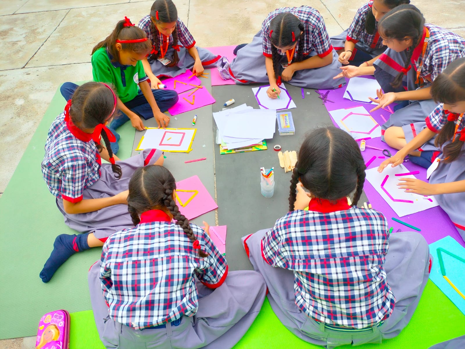 Students learning about Shapes under FLN