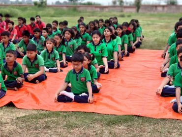 Students relax and rejuvenate while doing Yoga