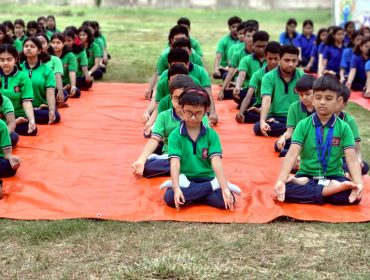 Students perform Yoga-Concentration is the Key