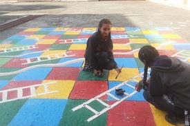 Warli painting and ladder game in bala project