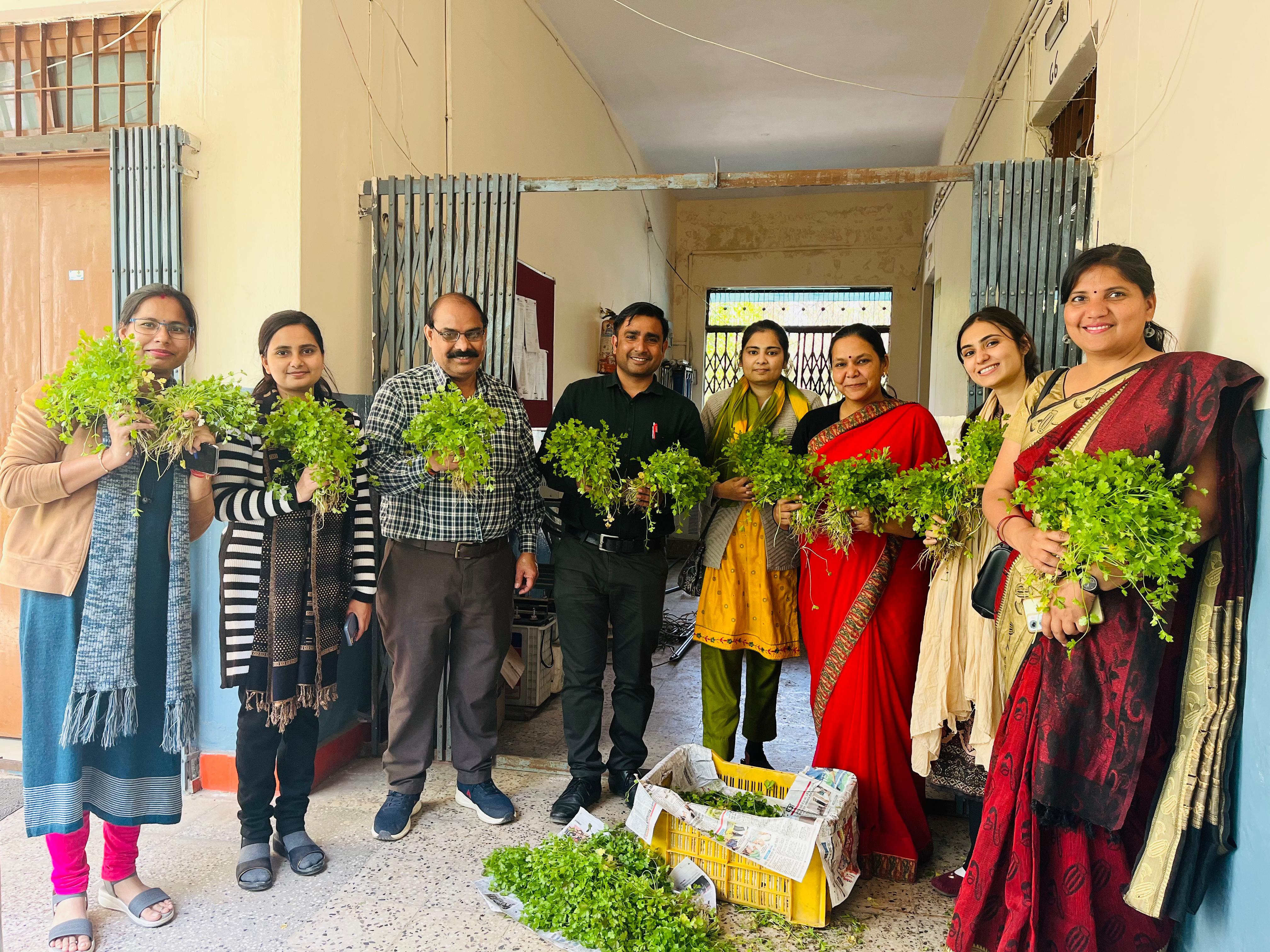 kitchen garden photo teachers with principal