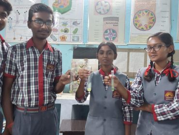 Science Lab Activities (Student doing experiment)