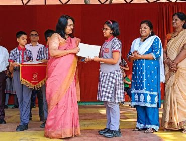 Certificate to class 10 CBSE Board topper Lisa Sinha.