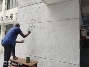 Painting Work on the School Building Is in Progress