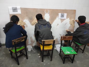 Image Showing: Students doing Art and Craft in PMKVY room