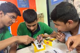 Student making a parallel circuit