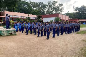 photo of assembly by scout and guide students