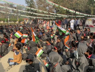 SCHOOL STUDENTS WITH FLAGS