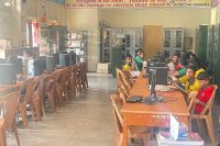 boys reading in library