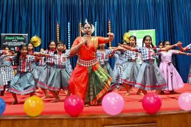 Odissi Dancer teaching Students