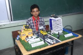 A Student with his Innovation model.