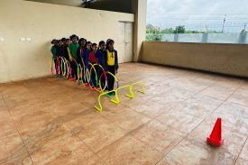 Students playing with hoops