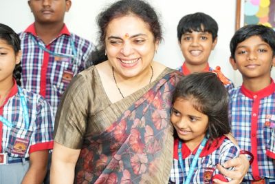 commissioner with children